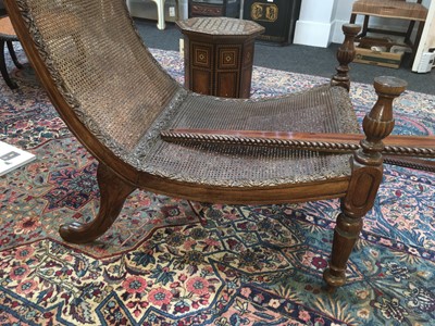 Lot 193 - An Anglo-Indian padouk bergère open armchair