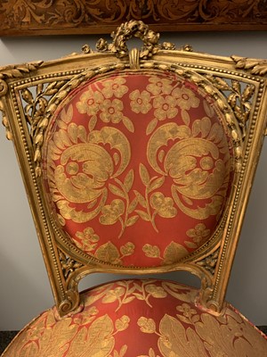 Lot 692 - A pair of French Louis XVI-style giltwood salon chairs