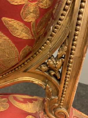 Lot 692 - A pair of French Louis XVI-style giltwood salon chairs