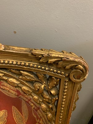 Lot 692 - A pair of French Louis XVI-style giltwood salon chairs