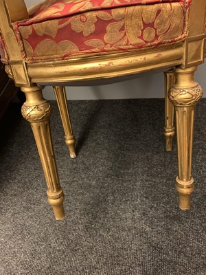 Lot 692 - A pair of French Louis XVI-style giltwood salon chairs