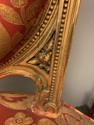 Lot 692 - A pair of French Louis XVI-style giltwood salon chairs