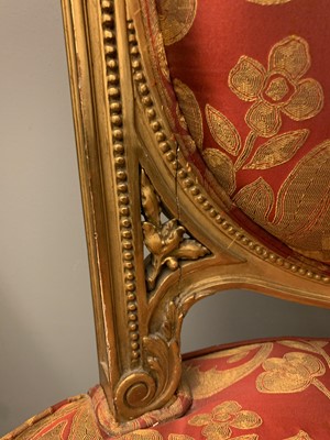 Lot 692 - A pair of French Louis XVI-style giltwood salon chairs