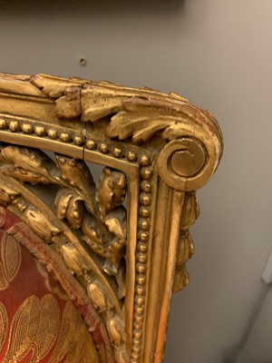 Lot 692 - A pair of French Louis XVI-style giltwood salon chairs