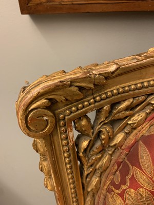 Lot 692 - A pair of French Louis XVI-style giltwood salon chairs