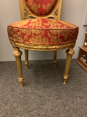 Lot 692 - A pair of French Louis XVI-style giltwood salon chairs