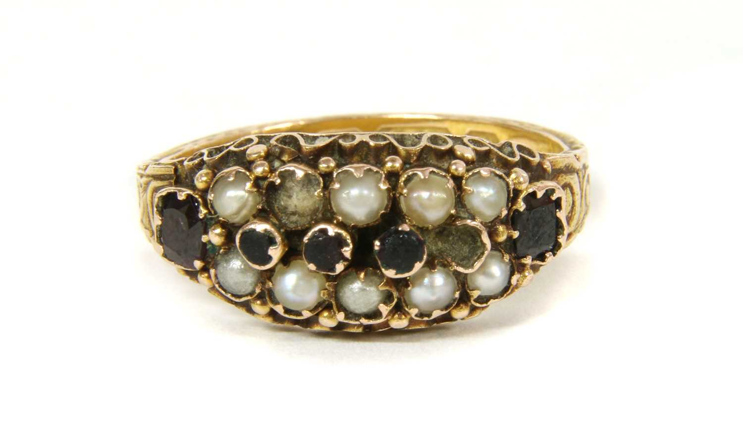 Lot 3 - A Victorian 15ct gold garnet and split pearl ring