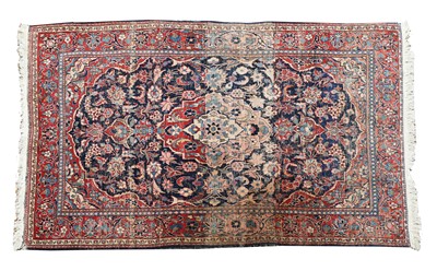 Lot 625 - A Persian blue ground rug