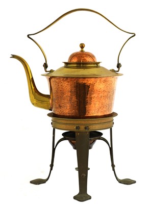 Lot 160 - A Birmingham Guild of Handicraft copper and brass kettle on stand