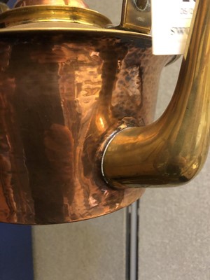 Lot 160 - A Birmingham Guild of Handicraft copper and brass kettle on stand