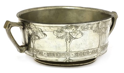 Lot 191 - A Tudric pewter twin-handled bowl