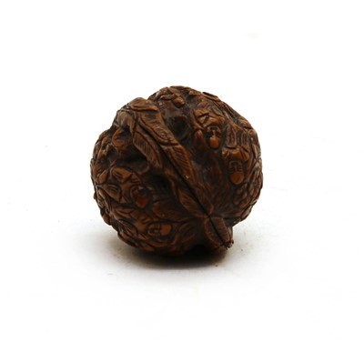 Lot 67 - A Chinese complete walnut shell