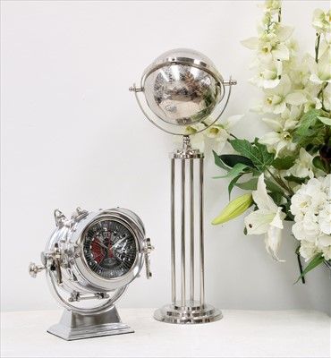 Lot 1230 - A Royal Master aluminium chrome clock and a chrome globe on stand