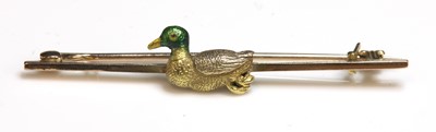 Lot 103 - A gold enamel duck or mallard bar brooch, or stock pin, c.1930