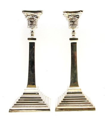 Lot 185 - A pair of silver candlesticks