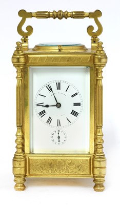 Lot 569 - A French brass carriage clock