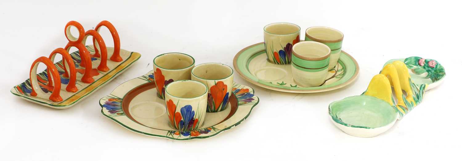Lot 370 - A Clarice Cliff 'Crocus' pattern egg cup set