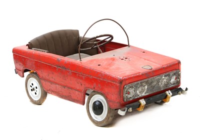 Lot 270 - A red painted tinplate pedal car by Moskvich