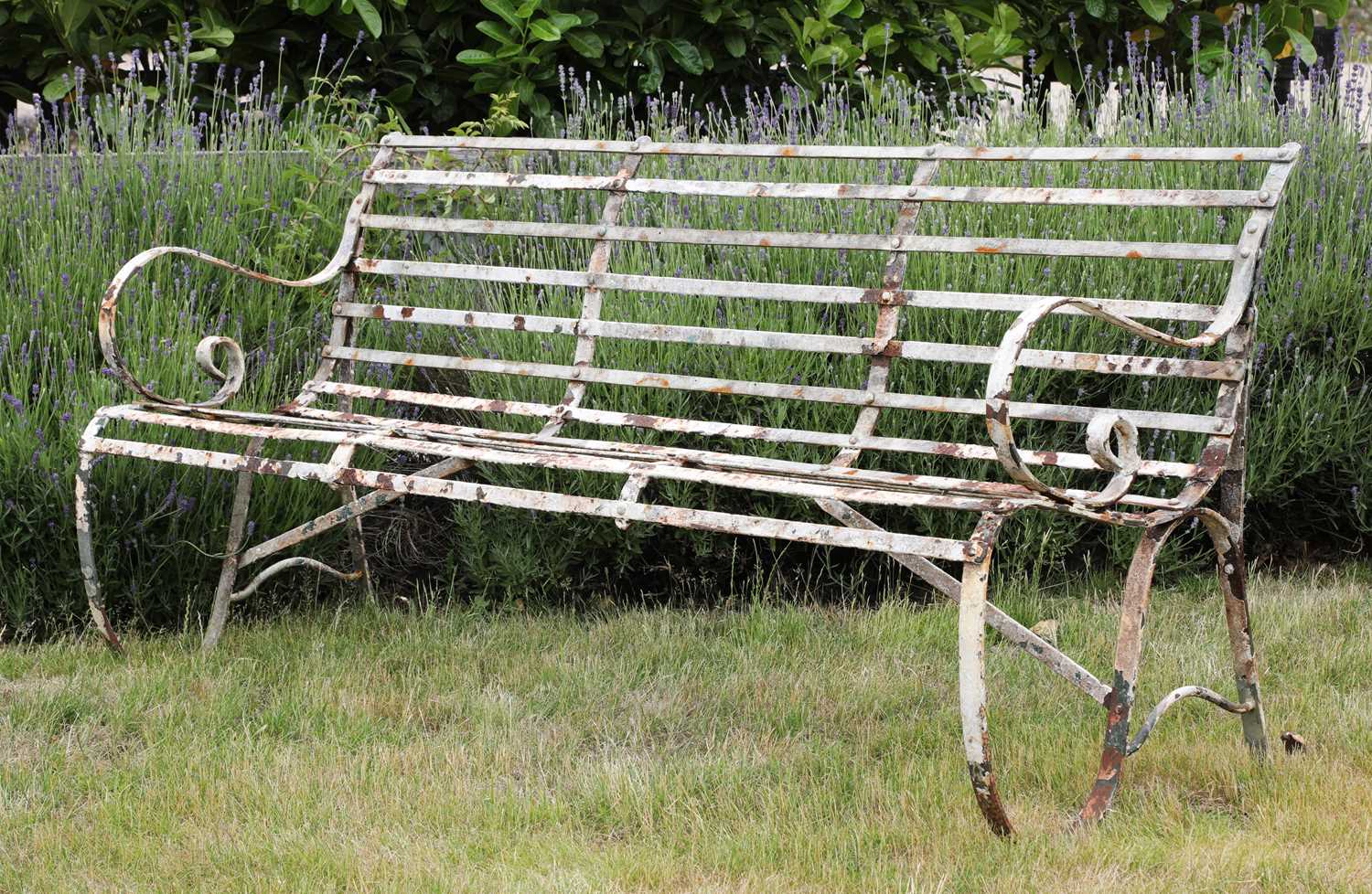 Lot 286 - A steel three-seater garden bench