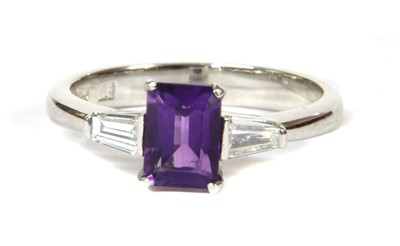 Lot 146 - A white gold amethyst and diamond three stone ring