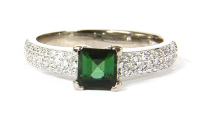 Lot 95 - An 18ct white gold green tourmaline and diamond ring