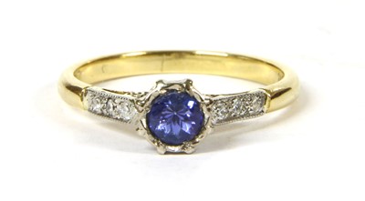 Lot 99 - An 18ct gold tanzanite and diamond ring