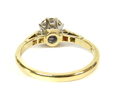 Lot 99 - An 18ct gold tanzanite and diamond ring