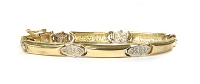Lot 151 - A gold cubic zirconia bracelet
