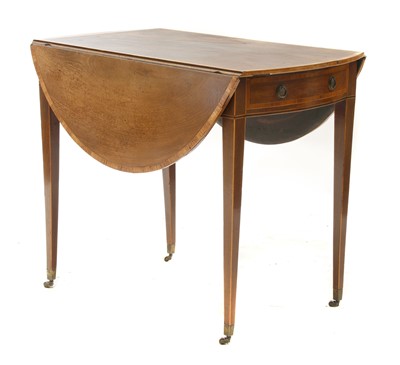 Lot 165 - A Sheraton period mahogany oval Pembroke table