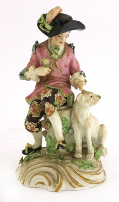 Lot 236 - A Samson figure of a young man and his dog