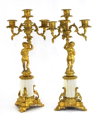 Lot 160 - A pair of Gustavian ormolu and marble-mounted four-branch candelabra