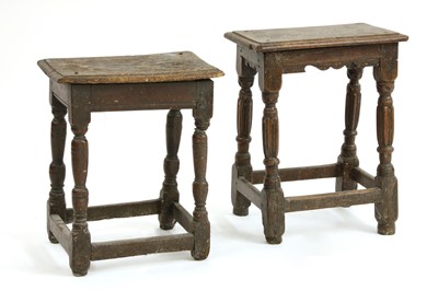 Lot 656 - Two carved oak joined stools