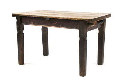 Lot 499 - A pine topped farmhouse-type table