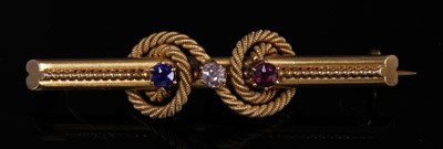 Lot 47 - A Victorian gold diamond, sapphire and ruby bar brooch