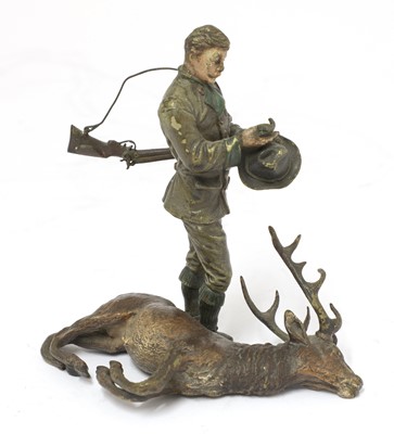 Lot 256 - A Vienna cold painted bronze of a deerstalker standing over a dead stag