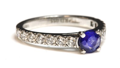 Lot 56 - A platinum sapphire and diamond ring