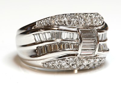 Lot 266 - A white gold diamond set bombé form band ring
