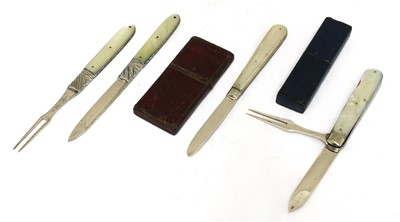 Lot 26 - Four silver and mother-of-pearl folding fruit knives and forks