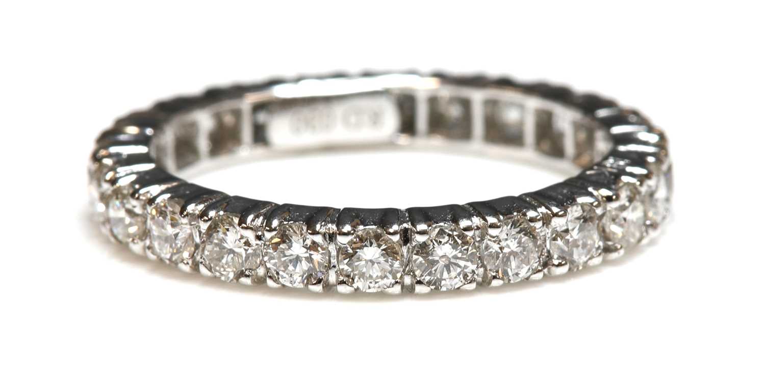 Lot 274 - A Continental white gold diamond set full eternity ring