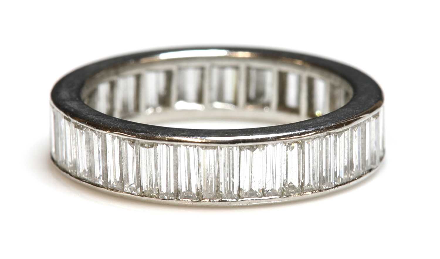 Lot 276 - A platinum diamond set full eternity ring