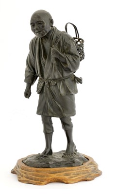 Lot 380 - A Japanese bronze figure