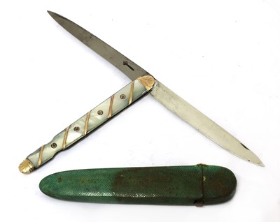 Lot 19 - A French gold and mother-of-pearl fruit knife