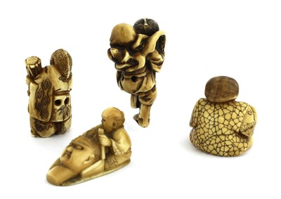 Lot 132 - A collection of four Japanese ivory netsuke