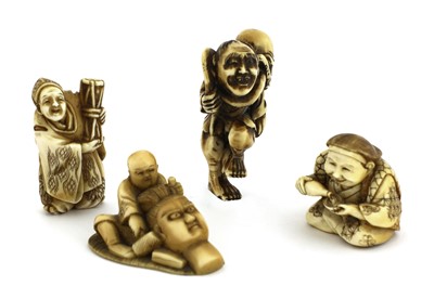 Lot 132 - A collection of four Japanese ivory netsuke