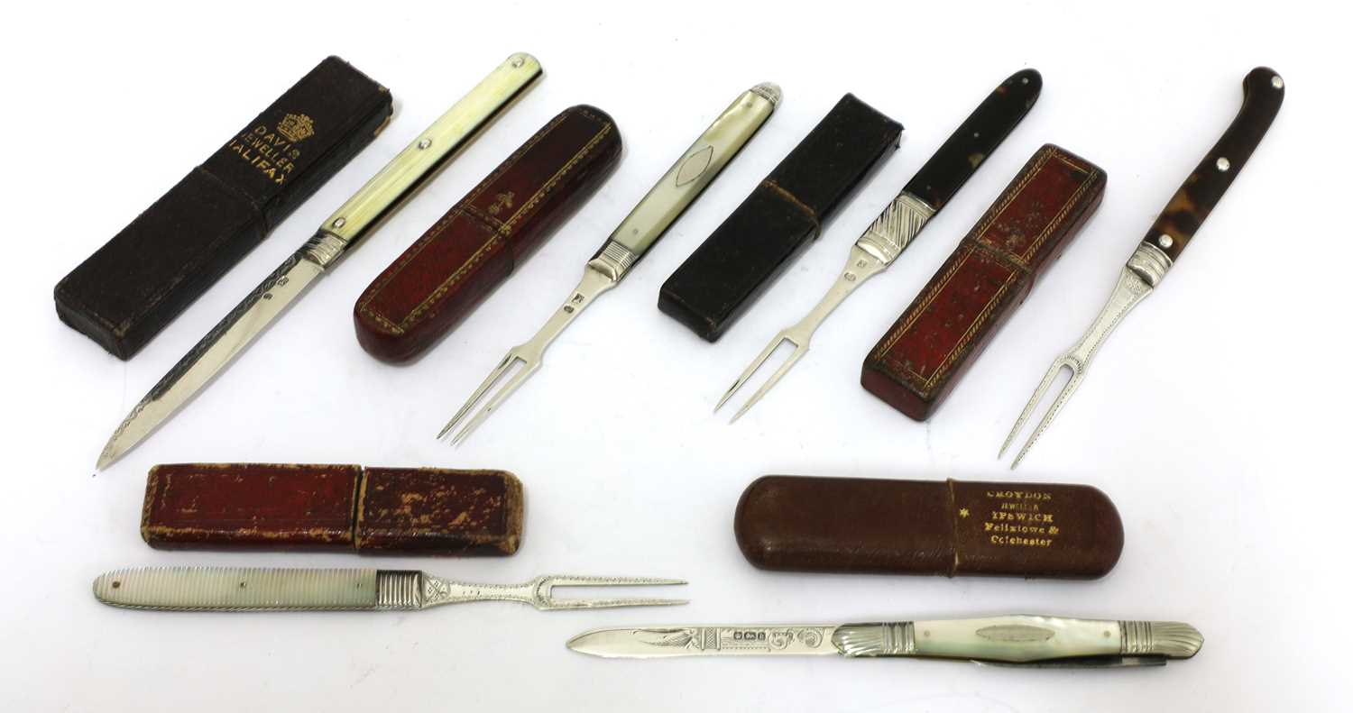 Lot 29 - Six silver-mounted folding fruit knives and forks in cases