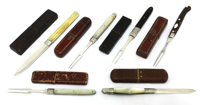 Lot 29 - Six silver-mounted folding fruit knives and forks in cases