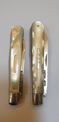 Lot 32 - Five silver and mother-of-pearl folding fruit knives and a fork