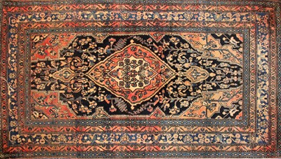 Lot 476 - A Persian design rug