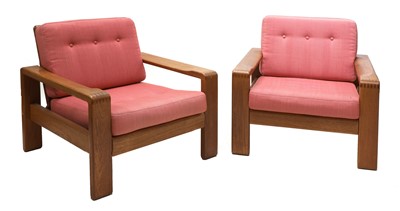 Lot 269 - A pair of teak lounger chairs