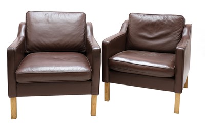Lot 260 - A pair of Scandinavian brown leather armchairs